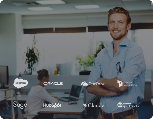 Finance professional in an office with integration logos — Salesforce, Oracle, OneDrive, Microsoft Dynamics 365, Sage, HubSpot, Claude, QuickBooks